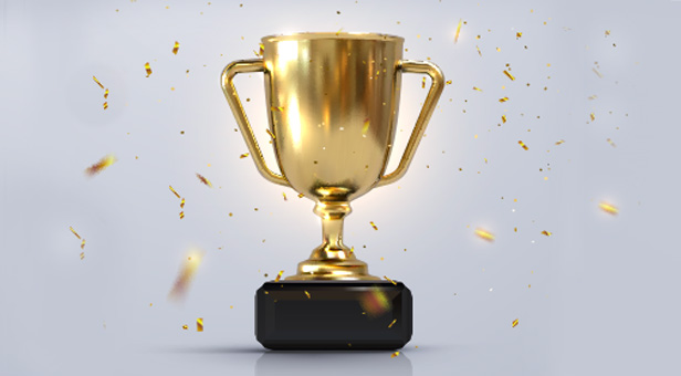 gold trophy award with confetti