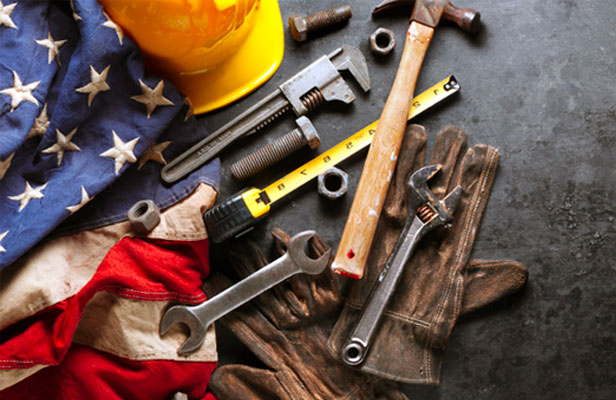 Manufacturing tools next to American flag