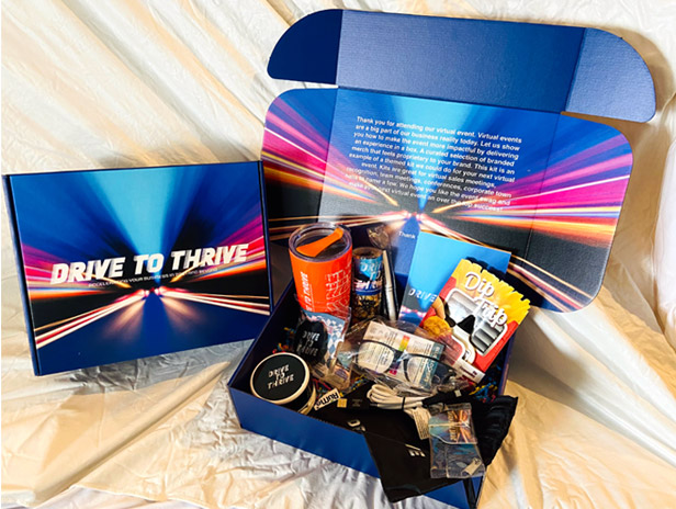 D2T event box with assortment of promo products