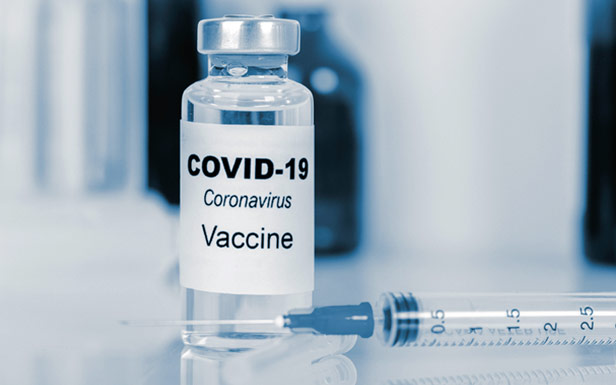 Covid vaccine, vial and needle