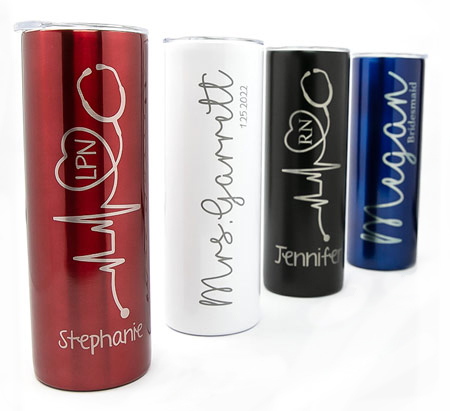 Four laser-engraved tumblers