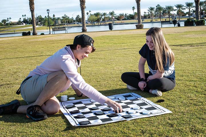 Kids playing checkers