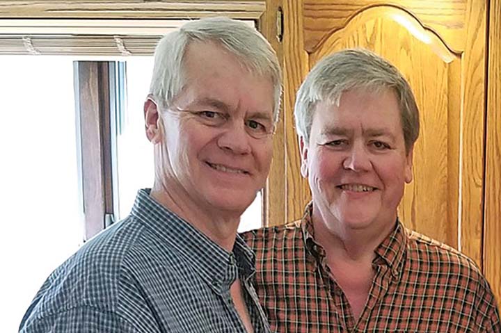 Rob Paschal (left) is the the current owner of the family-run Warwick Publishing, which has been operating since 1881. His brother and co-owner Jim (right) passed away in May at the age of 62.