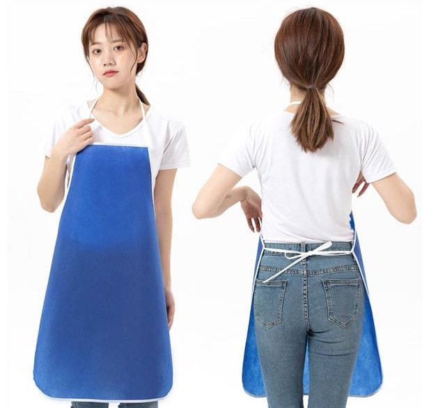 woman wearing blue apron