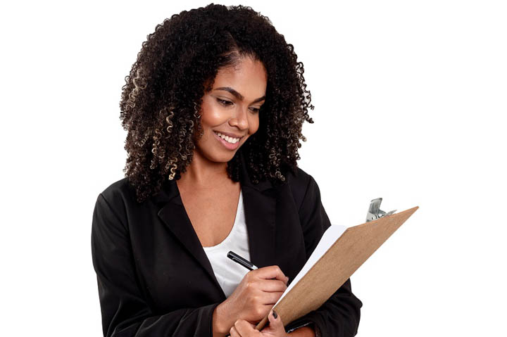 Young woman with clipboard