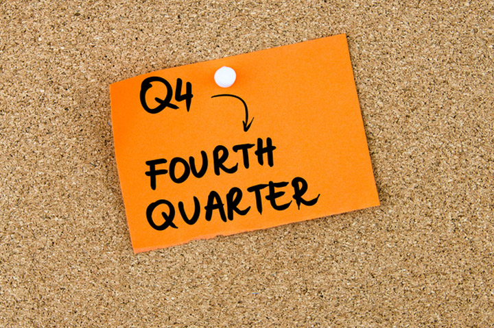 Q4 fourth quarter on orange post-it note