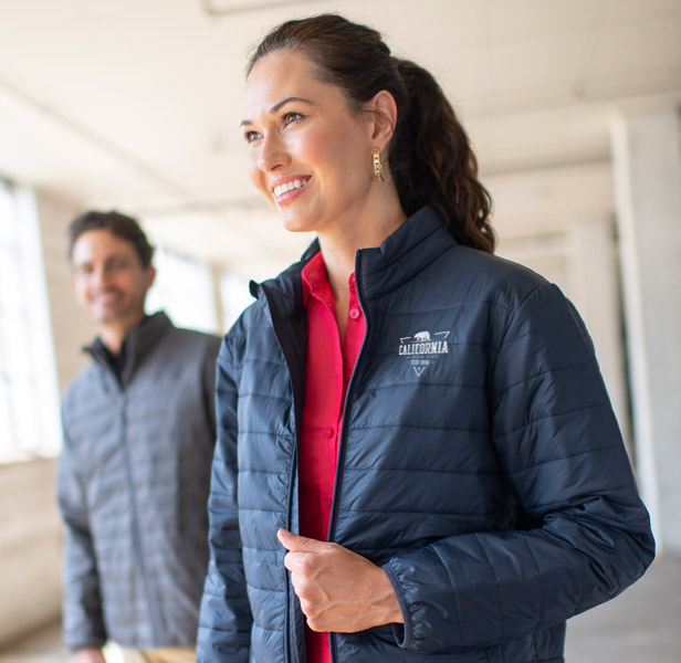 woman wearing lightweight navy blue puffer jacket