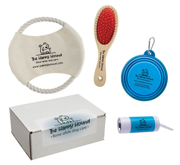 pet kit with hairbrush, bowl, bags, toys
