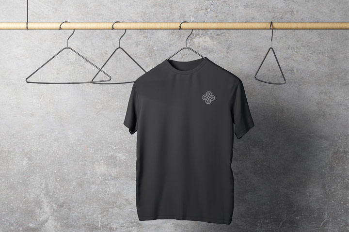 black t-shirt on hanger