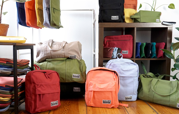 colorful backpacks on wooden floor