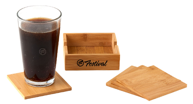 bamboo coaster set and glass of dark beverage