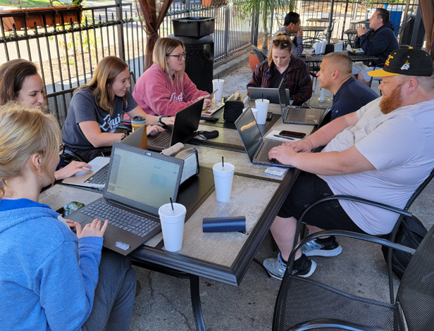 Liquid Screen employees working