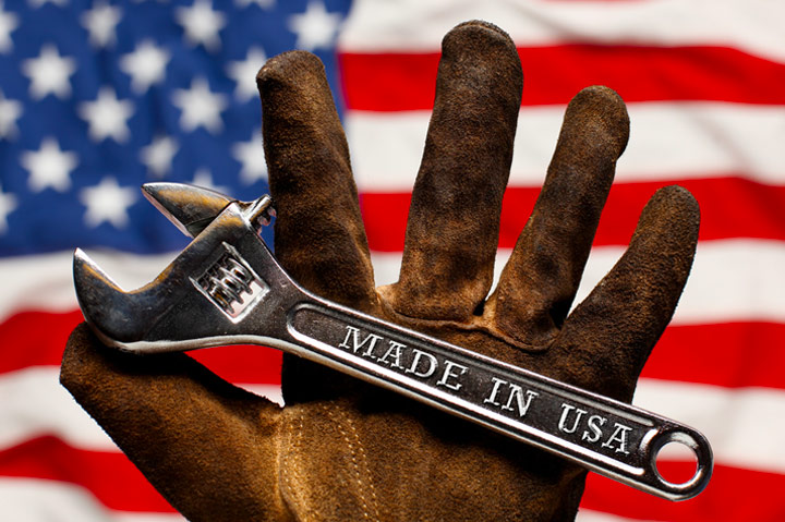 Made in USA on wrench in old, worn glove