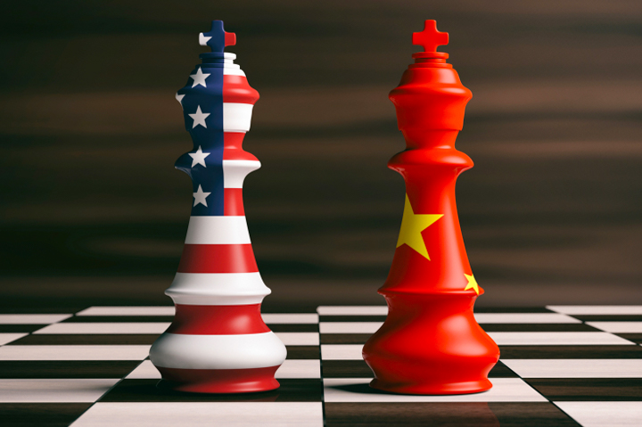 US and Chinese chess pieces on chess board