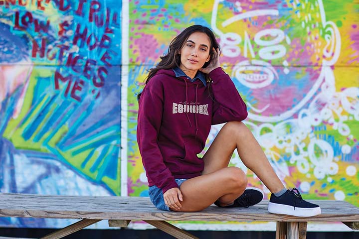 Young woman in maroon hoody
