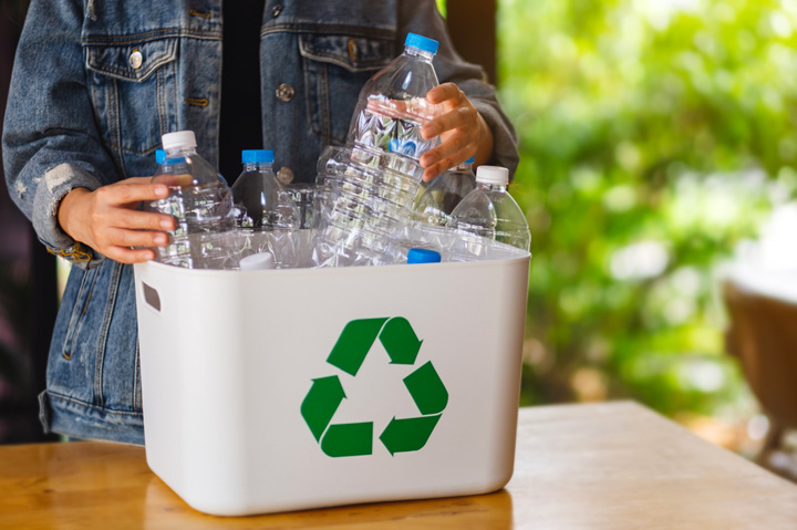 recycling container full of plastic bottles