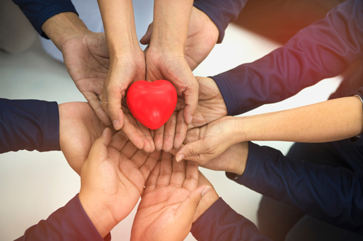 hands holding heart