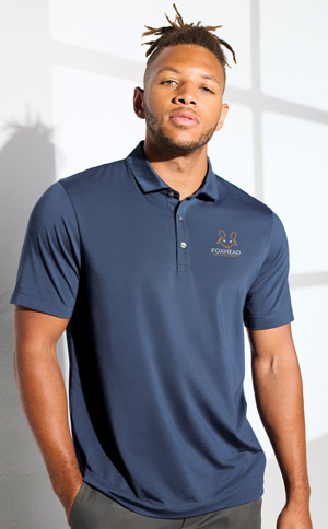 young man wearing navy blue polo shirt