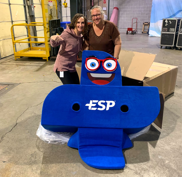 ESP+ arrival at ASI warehouse, two women