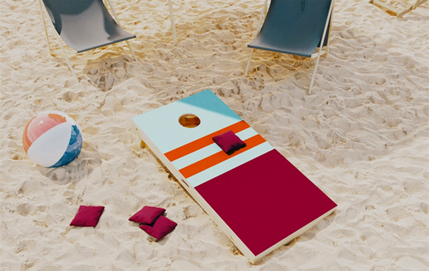 cornhole set on beach