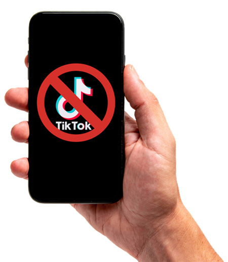 TikTok app on phone with red ban symbol through it