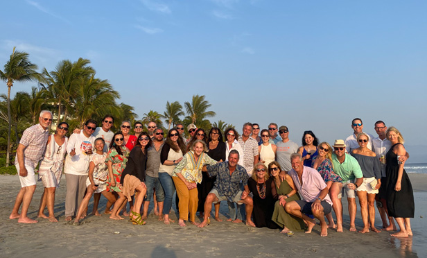 Promoshop employees on beach in Mexico