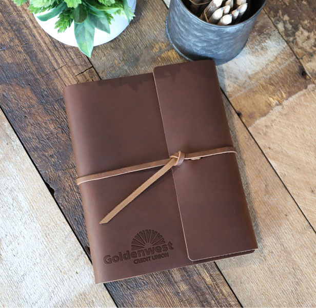 flap-tie leather journal