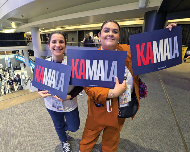 DNC goers holding Kamala signs