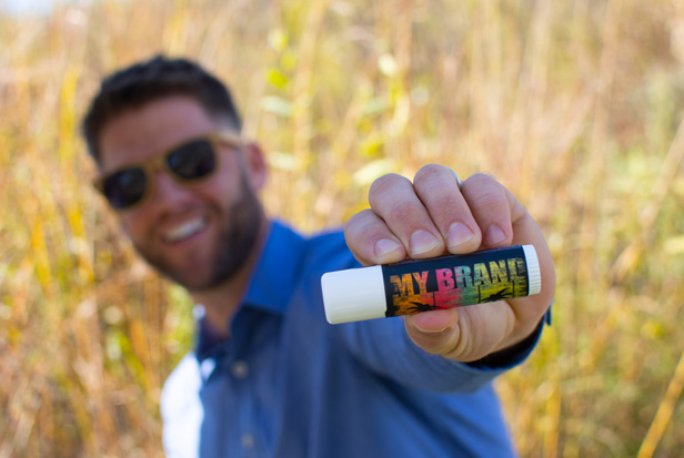 man holding sunscreen stick