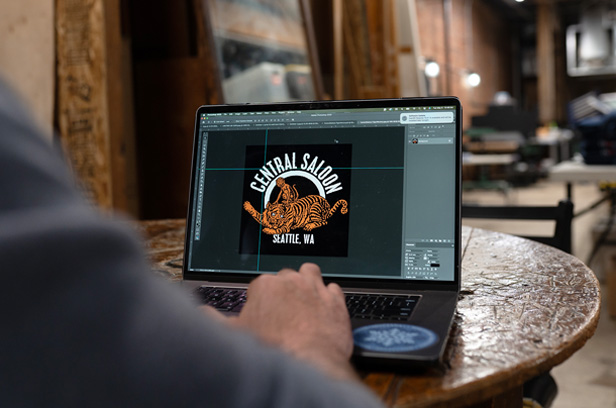 vector t-shirt artwork on laptop screen
