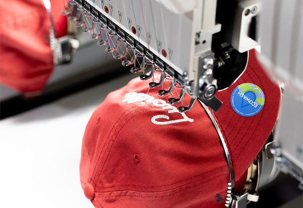 red hat on embroidery machine