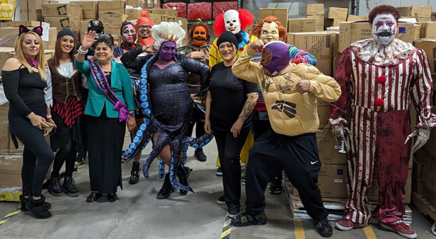 Logomark employees dressed up for Halloween
