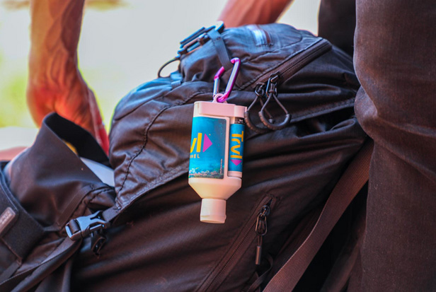 sunscreen carabiner on backpack