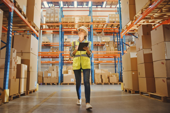 woman walking in warehouse