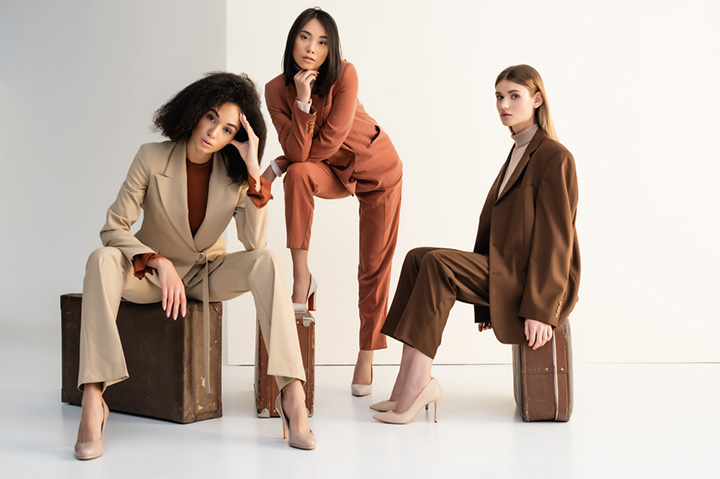 three women modeling quiet luxury fashion