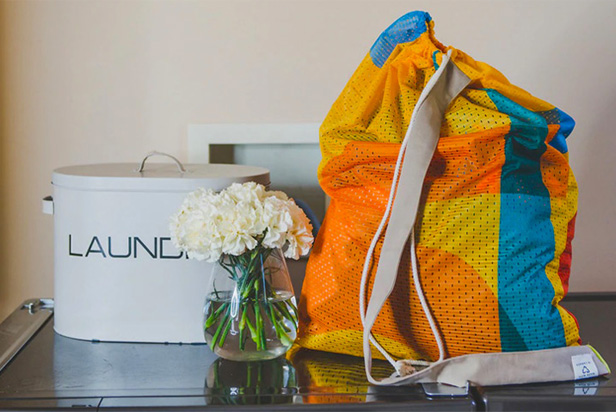 collection of bags made from single-use street pole banners