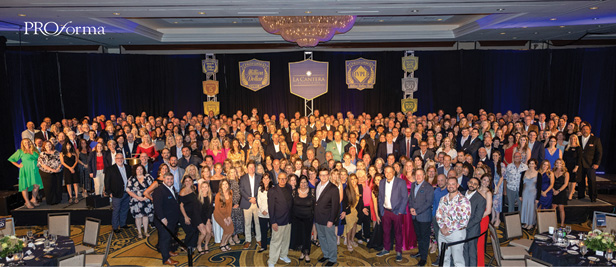 Members of Proforma’s Million Dollar Club in a group photo