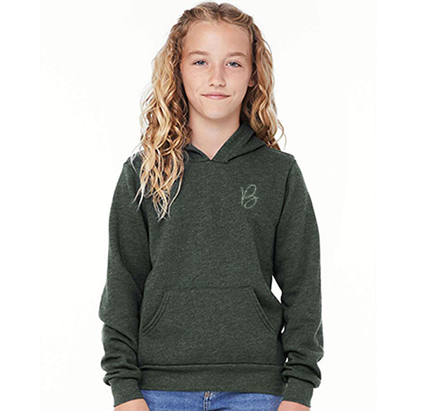 young girl in green hoodie